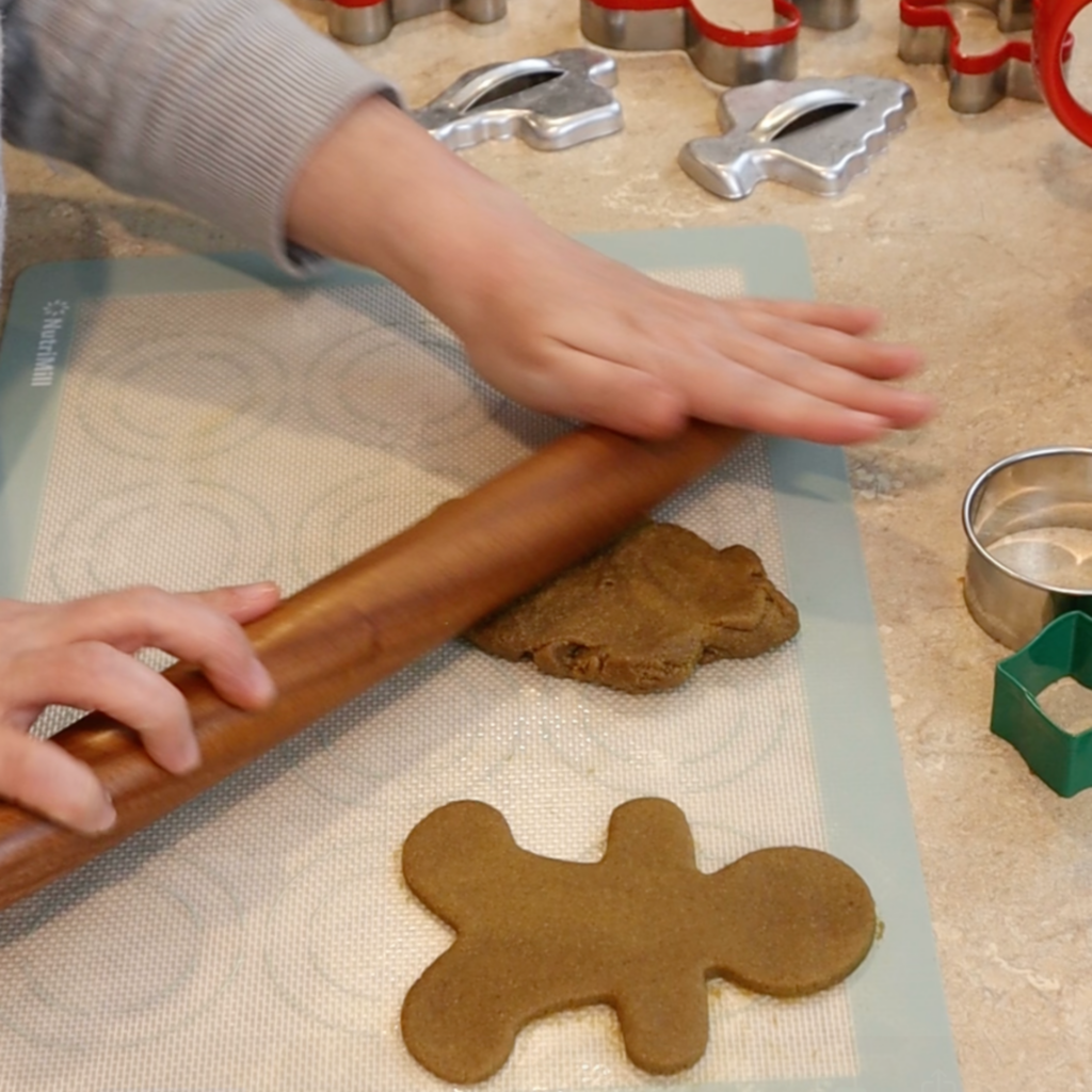Rolling gingerbread cookies made with fresh milled flour